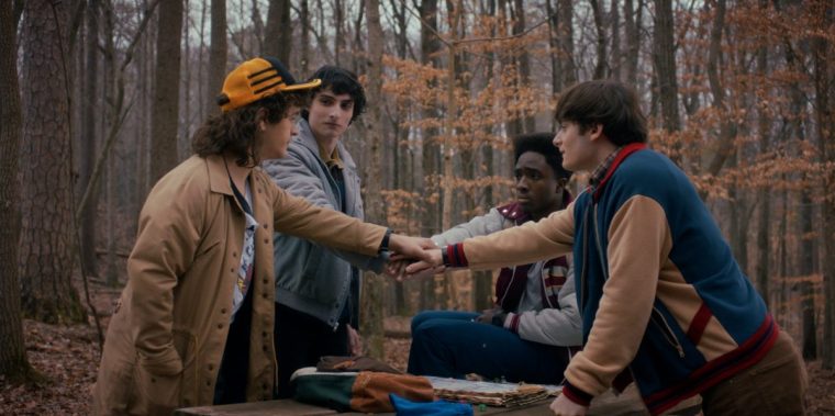 TV Stills: STRANGER THINGS: SEASON 5. (L to R) Gaten Matarazzo as Dustin Henderson, Finn Wolfhard as Mike Wheeler, Caleb McLaughlin as Lucas Sinclair, and Noah Schnapp as Will Byers in STRANGER THINGS: SEASON 5. Cr. Courtesy of Netflix ????2025 Netflix TV Still Season 5