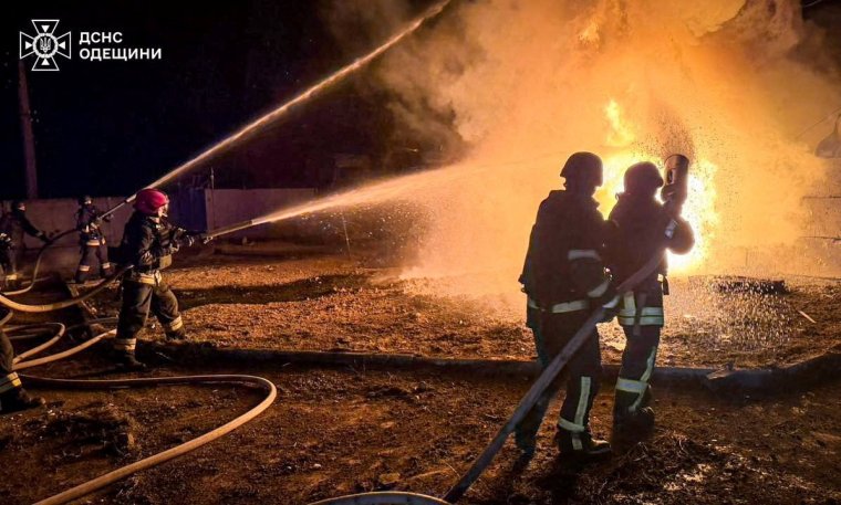 Firefighters work at the site of the Russian drone strike, amid Russia's attack on Ukraine, in Odesa region, Ukraine in this handout picture released November 11, 2025. Press service of the State Emergency Service of Ukraine in Odesa region/Handout via REUTERS ATTENTION EDITORS - THIS IMAGE HAS BEEN SUPPLIED BY A THIRD PARTY. MUST NOT OBSCURE LOGO.