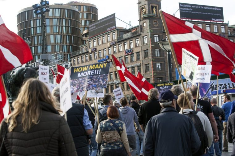 COPENHAGEN, DENMARK - OCTOBER 01: Protestors organised by For Freedom (Danish, read: For Frihed) walks in demonstration aganist Muslim through the inner city of Copenhagen in Denmark on October 01, 2016. At the photo the demonstration is leaving the City Hall Square for Axelborg Square (Danish, read: Axelborg Torv). (Photo by Ole Jensen/Corbis via Getty images)