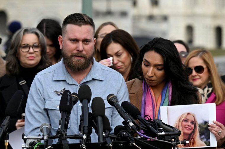 Sky and Amanda Roberts, brother and sister-in-law of late sex offender Jeffrey Epstein's late victim Virginia Giuffre, attend a press conference on the Epstein Files Transparency Act ahead of a House vote on the release of files related to Jeffrey Epstein, on Capitol Hill in Washington, D.C., U.S., November 18, 2025. REUTERS/Annabelle Gordon
