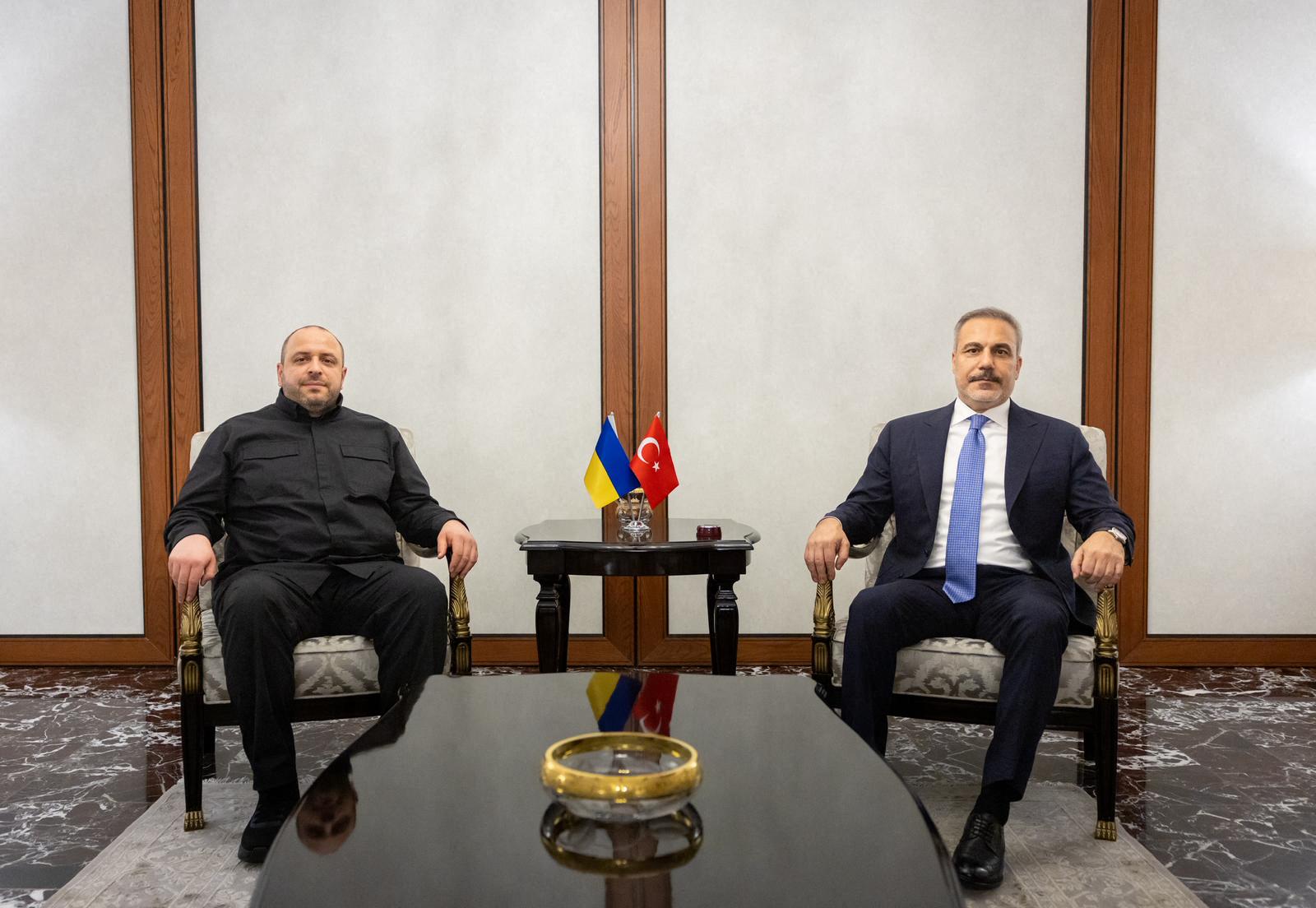 Turkish foreign minister Hakan Fidan (R) meeting with Head of the Ukrainian delegation and Ukraine's defence minister Rustem Umerov (L) in Ankara