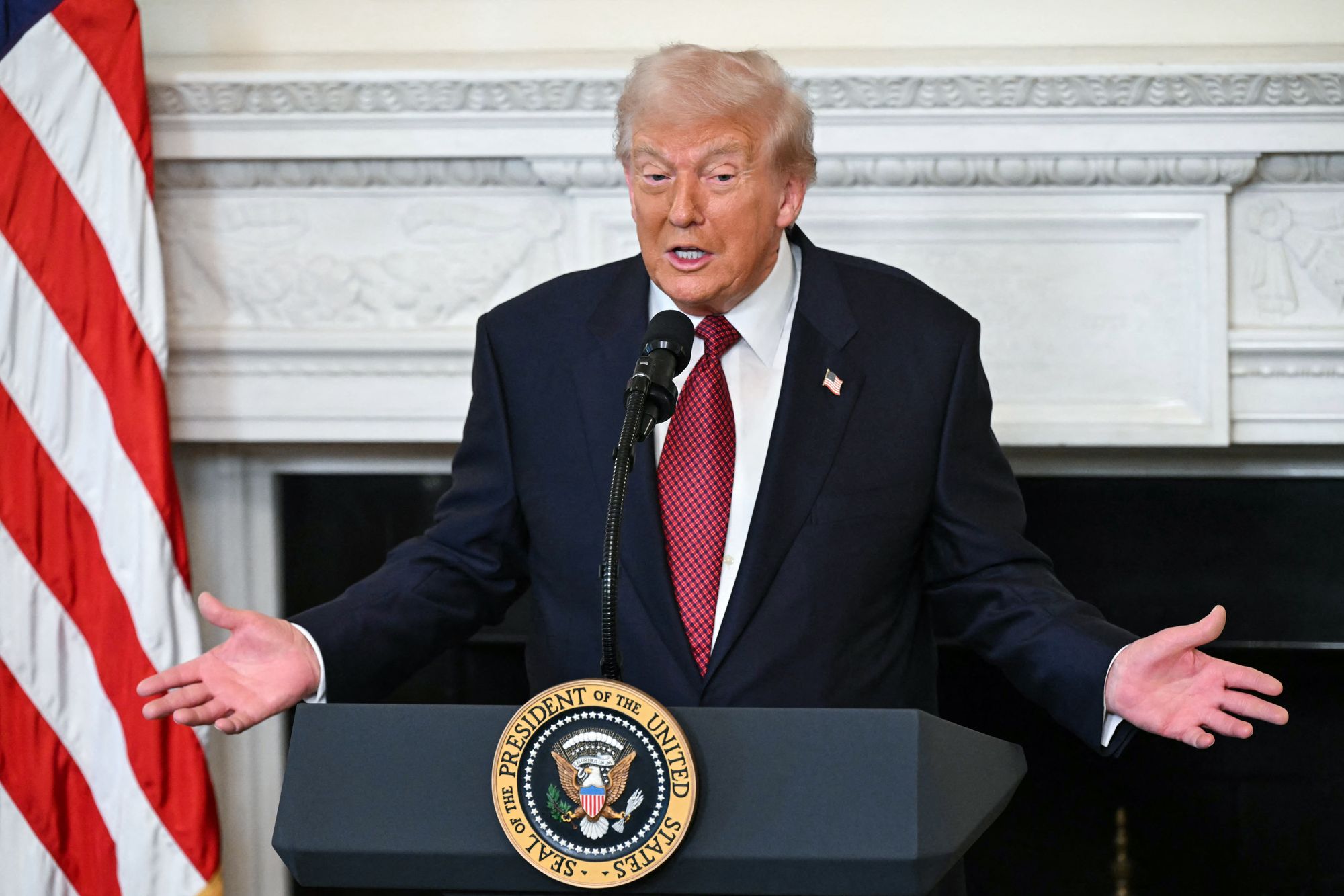 President Donald Trump speaks to Republican senators during a breakfast meeting in the State Dining Room of the White House Wednesday.