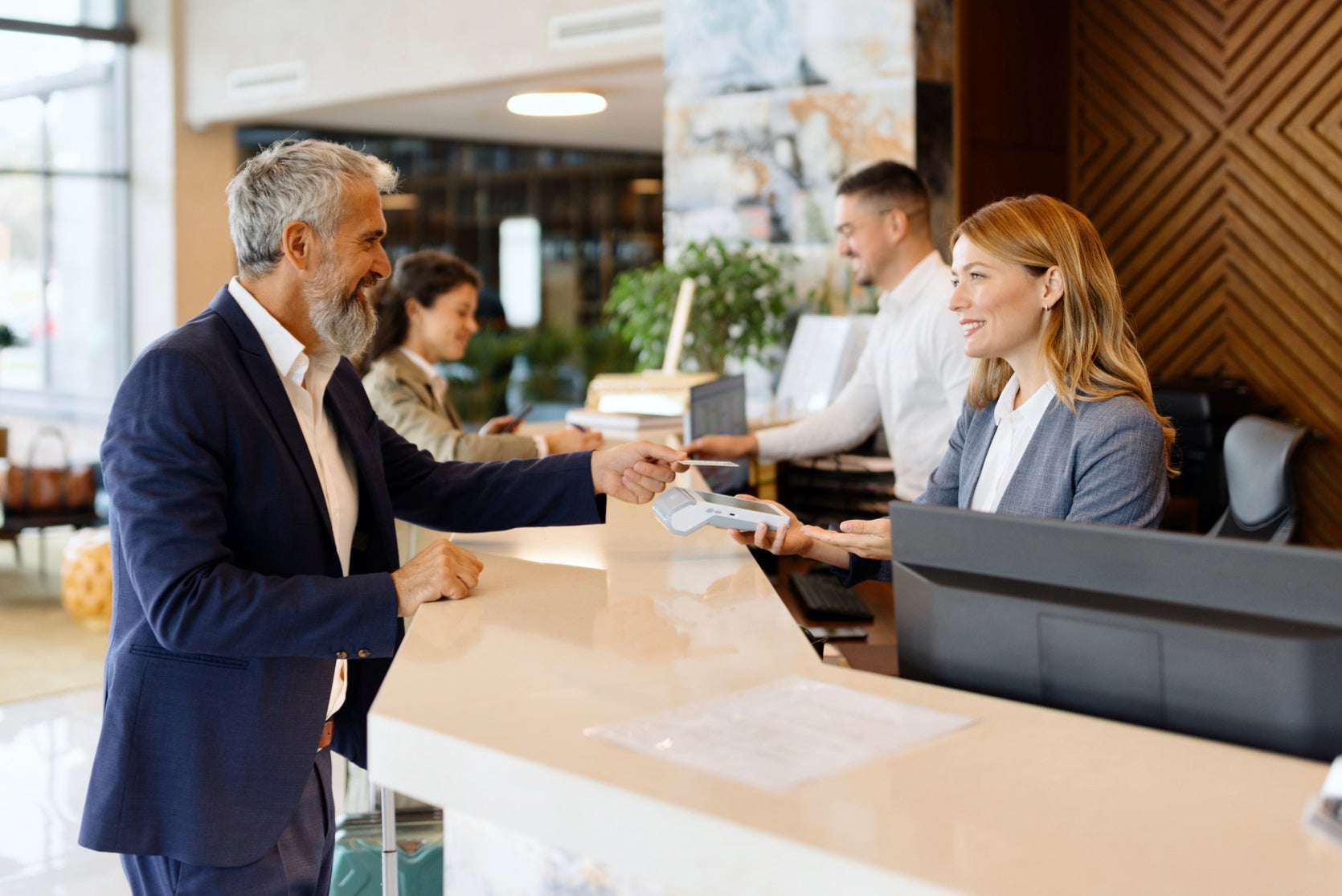 Visa and Mastercard are reportedly trying to negotiate a deal with merchants to lower fees stores pay for credit card transactions while also giving merchants the flexibility to reject certain cards, like those with rewards programs (stock image)