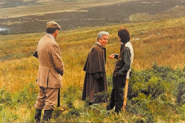 A newly released photo appears Jeffrey Epstein and Ghislaine Maxwell and an unidentified third person near Balmoral