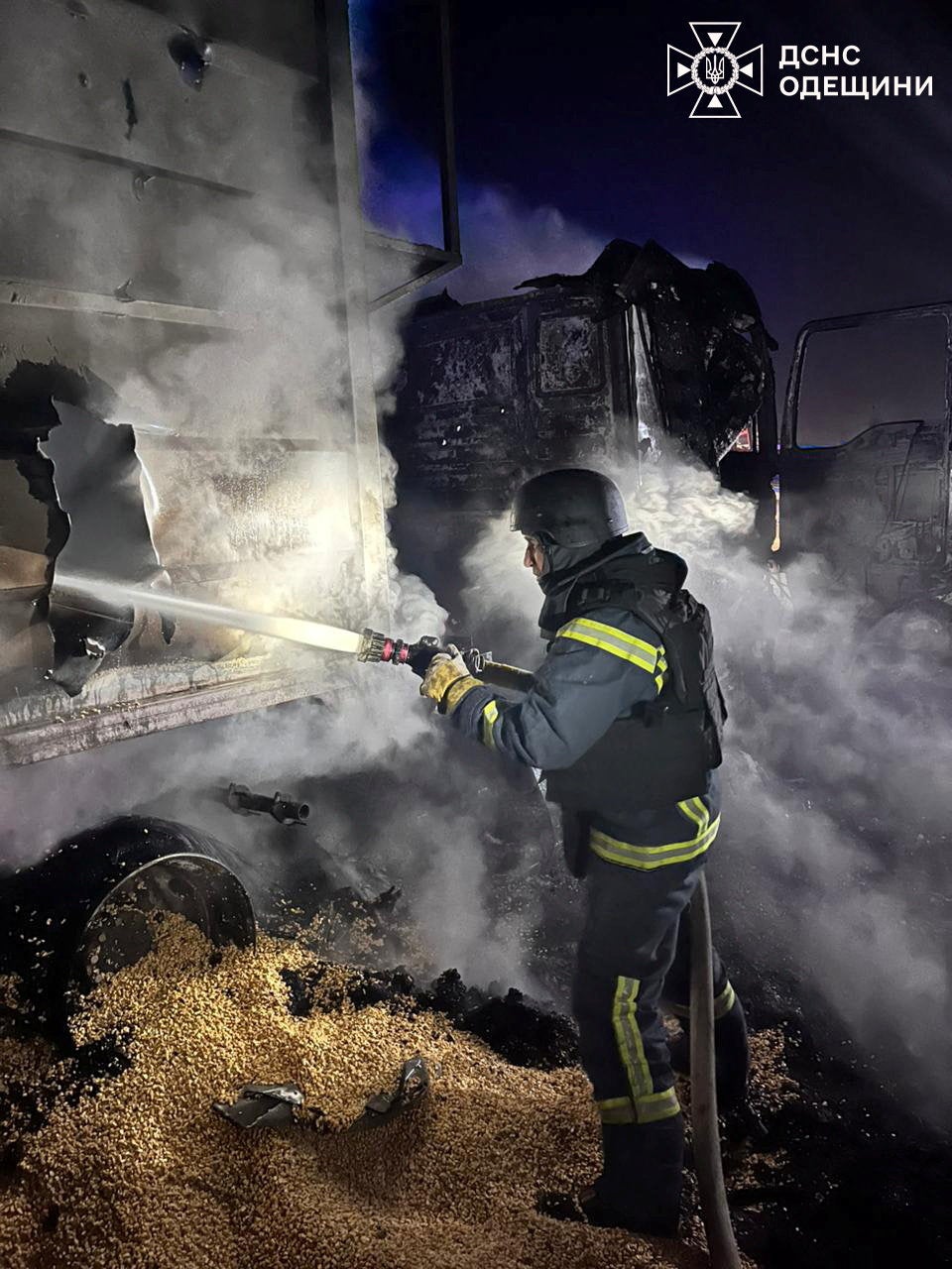 A firefighter works at the site of a Russian missile and drone strike in Odesa