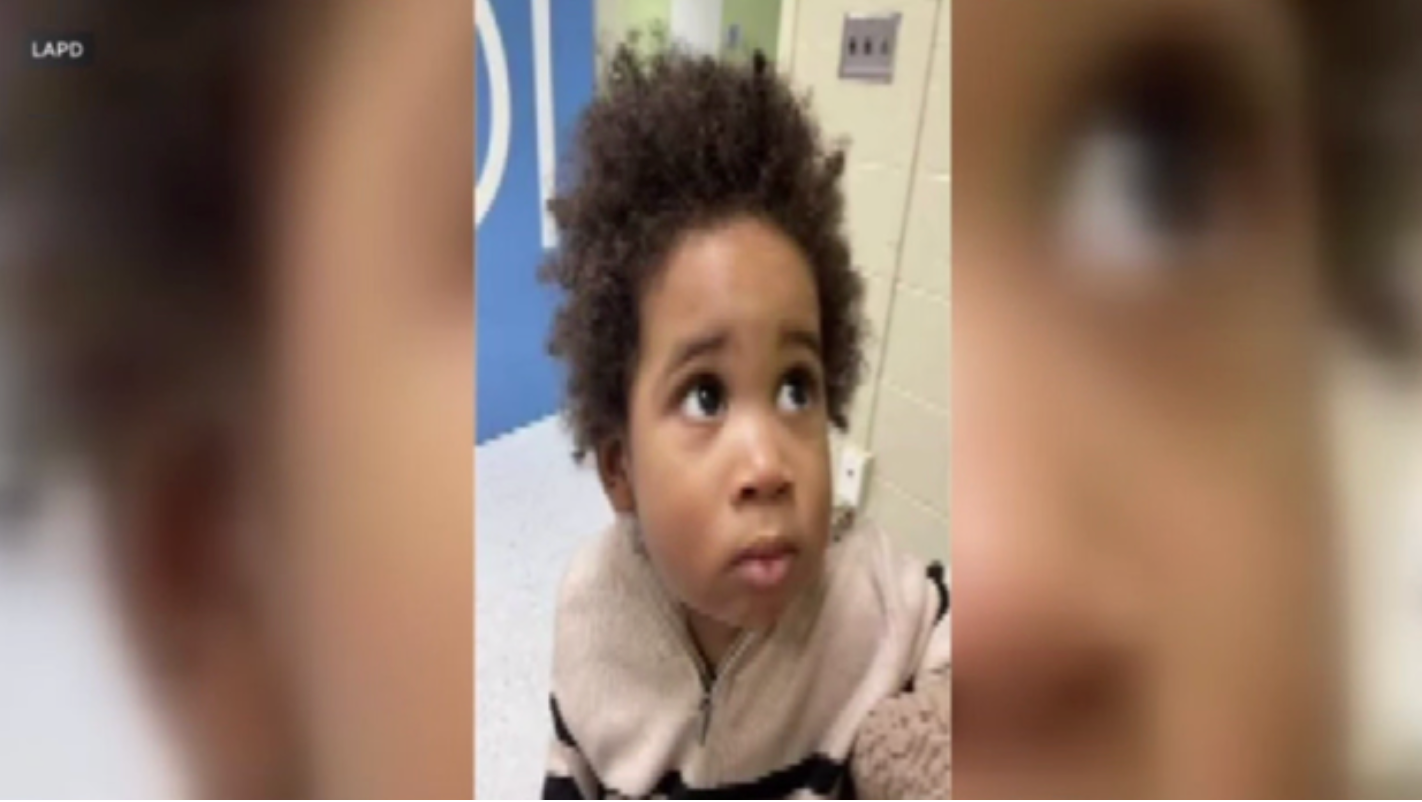 A toddler was found after an attempted carjacking as police try to identify him