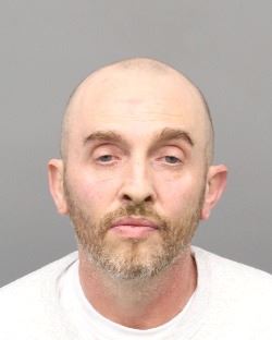 James Landi (pictured), now 43 and living in San Mateo, was arrested December 5 in connection with the 2004 killing of Reynaldo Burts, a Hemet resident whose death went unsolved for decades