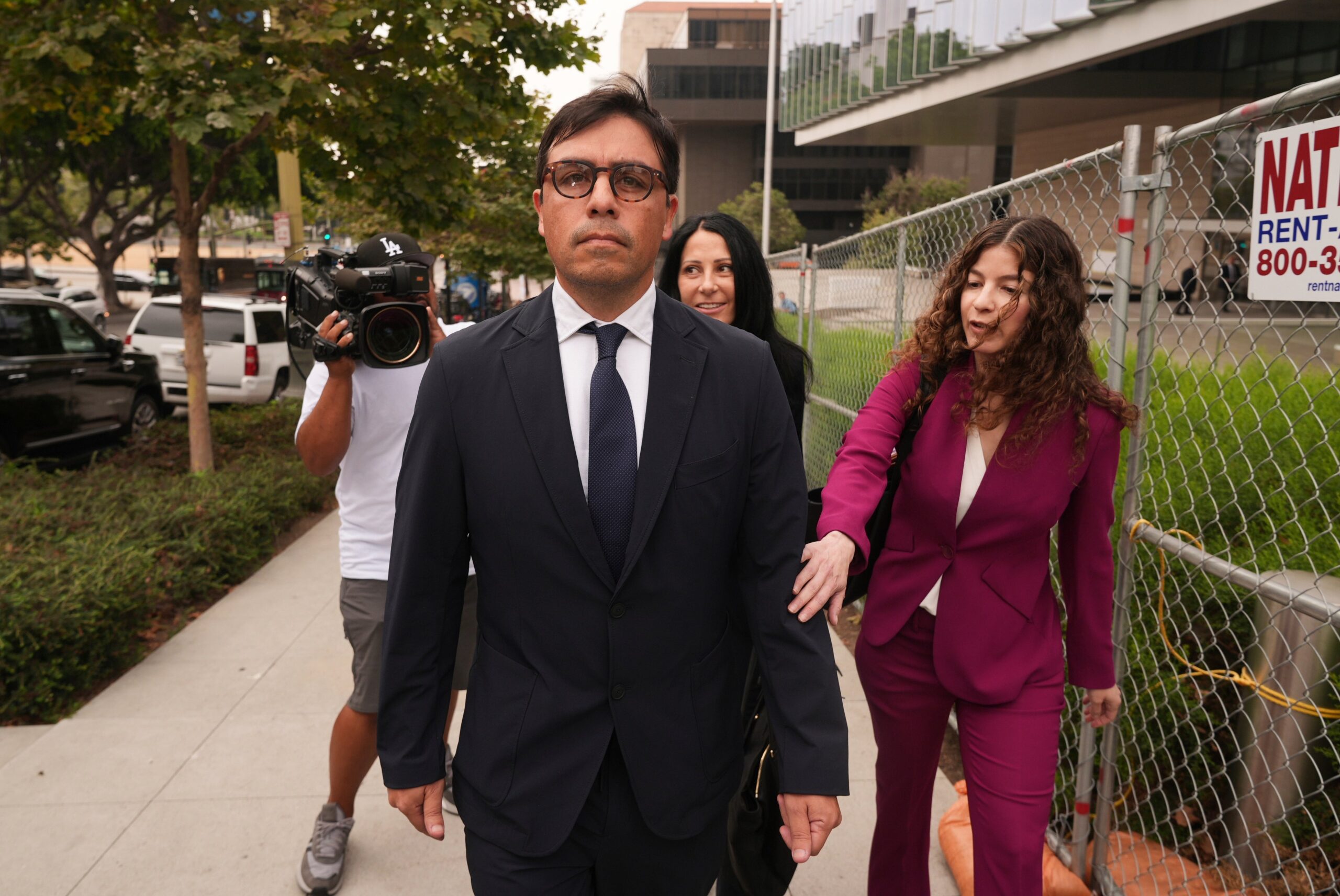 Dr. Salvador Plasencia leaves federal court with his attorneys July 23, 2025 in Los Angeles, after pleading guilty to giving ketamine to Matthew Perry, leading up to the actor's 2023 overdose death