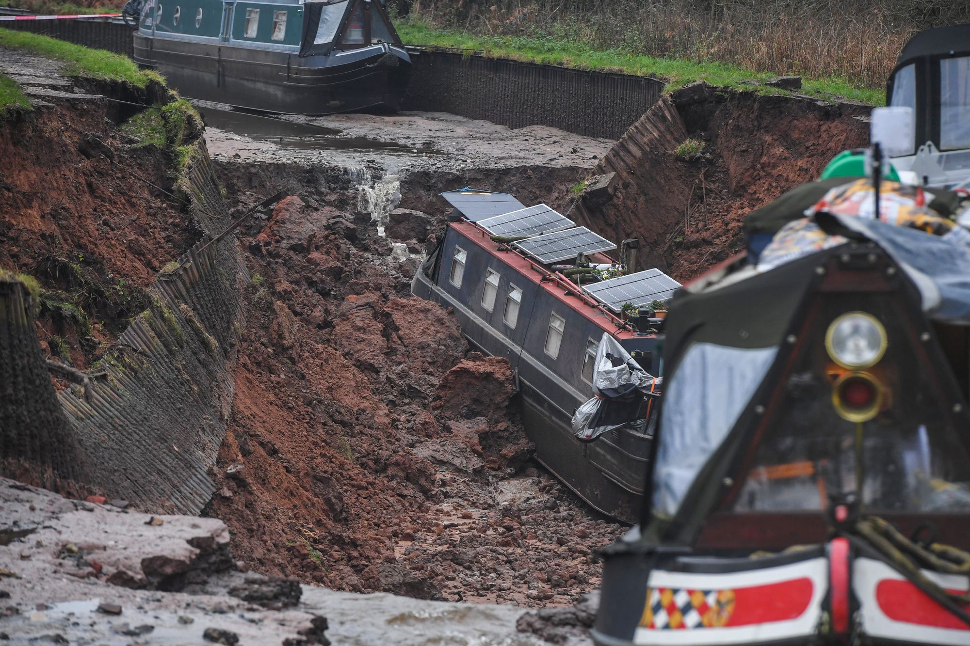 The scene in Whitchurch, Shropshire, where emergency services have declared a major incident after receiving reports at 4.22am this morning of a sinkhole causing large volumes of water to escape onto land in the Chemistry area of Whitchurch