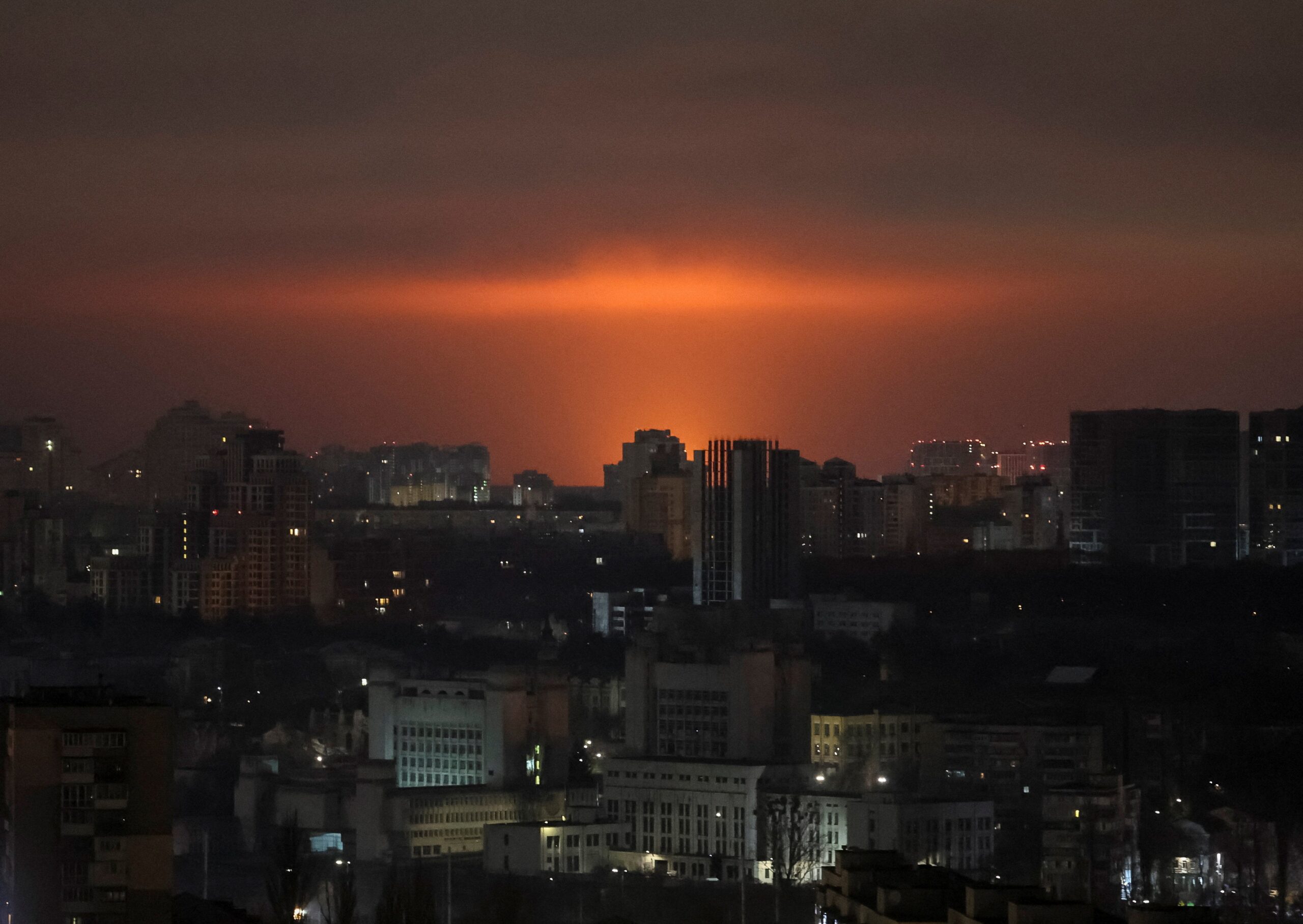 An explosion of a drone lights up the sky over the city during a Russian missile and drone strike, amid Russia's attack on Ukraine, in Kyiv, Ukraine December 6, 2025