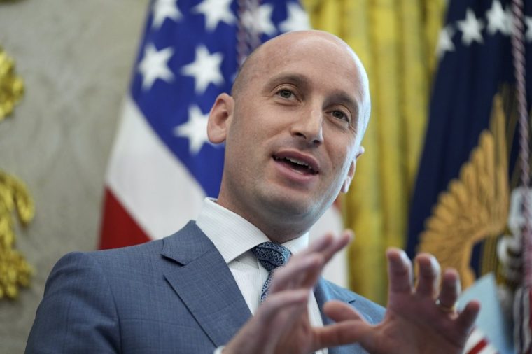 White House Deputy Chief of Staff Stephen Miller speaks as President Donald Trump holds an executive order signing in the Oval Office of the White House, Monday, Aug. 25, 2025, in Washington. (AP Photo/Evan Vucci)
