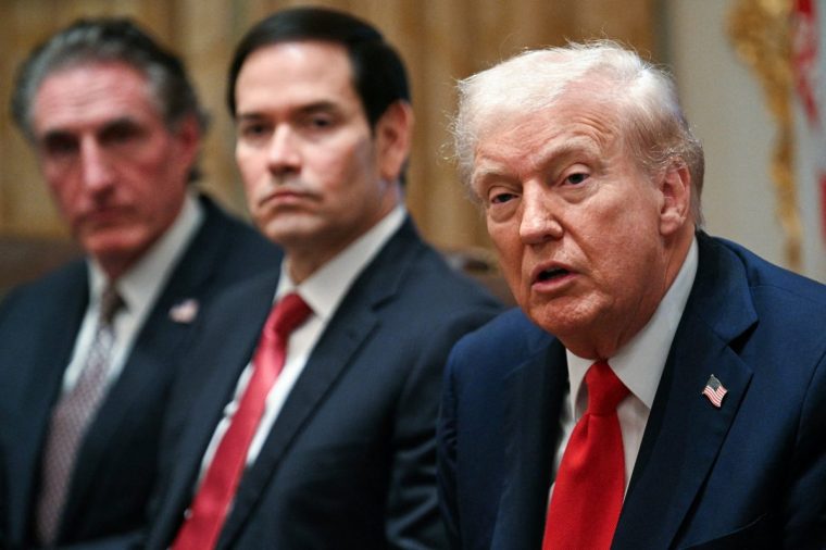 US President Donald Trump speaks alongside Secretary of the Interior Doug Burgum (L) and Secretary of State Marco Rubio (R) during a cabinet meeting in the Cabinet Room of the White House in Washington, DC, on October 9, 2025. Trump said Thursday he would try to go to Egypt for the signing of a Gaza ceasefire and hostage release deal between Israel and Hamas. (Photo by Jim WATSON / AFP) (Photo by JIM WATSON/AFP via Getty Images)