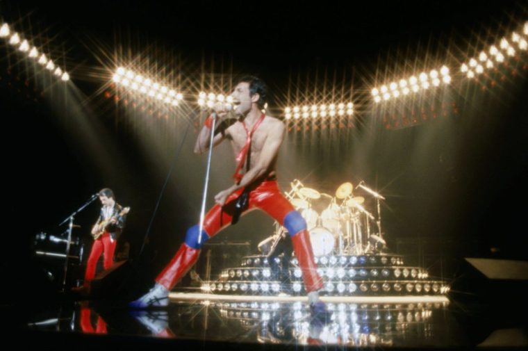 INGLEWOOD, CA - JULY 9: From left to right, musicians John Deacon and Freddie Mercury (1946 - 1991) of the British rock band Queen perform in concert at the Forum on July 9, 1980 in Inglewood, California. (Photo by Michael Montfort/Michael Ochs Archives/Getty Images)