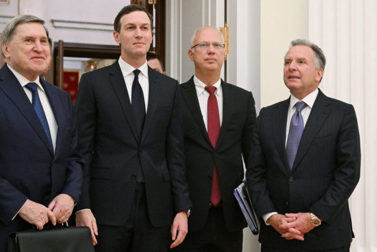 In this pool photograph distributed by the Russian state agency Sputnik, US special envoy Steve Witkoff and US President Donald Trump's son-in-law Jared Kushner, accompanied by Kremlin aide Yuri Ushakov and Kremlin economic envoy Kirill Dmitriev, are seen prior to a meeting with Russia's President at the Kremlin in Moscow on December 2, 2025. (Photo by Kristina Kormilitsyna / POOL / AFP via Getty Images)