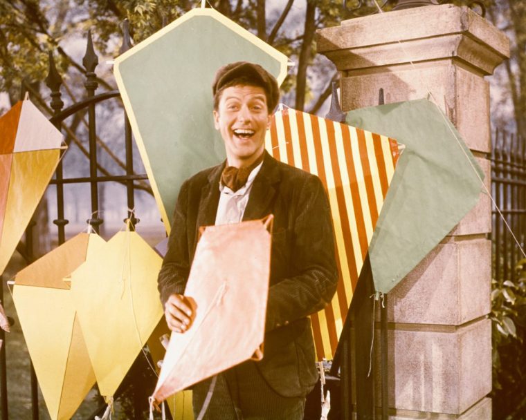 Dick Van Dyke, US actor, with a variety of kites in a publicity still for the film, 'Mary Poppins', USA, 1964. The film musical, directed by Robert Stevenson (1905??1986), starred Van Dyke as 'Bert'. (Photo by Silver Screen Collection/Getty Images)