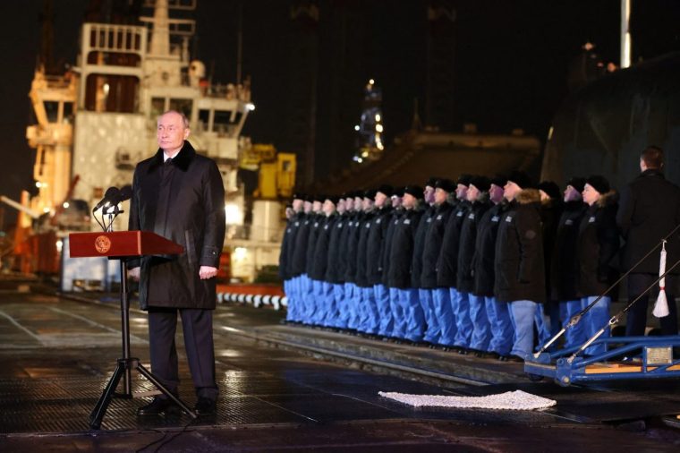 In this pool photograph distributed by the Russian state agency Sputnik, Russia's President Vladimir Putin attends a video-linked ceremony to launch the Project 885M Yasen-M nuclear-powered submarine Perm, in the Arctic Circle port city of Murmansk on March 27, 2025. (Photo by Gavriil Grigorov / POOL / AFP) (Photo by GAVRIIL GRIGOROV/POOL/AFP via Getty Images)
