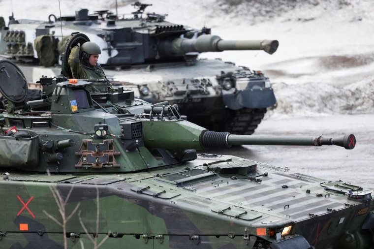 Swedish and Finnish tanks are seen during a military exercise called Cold Response 2022, gathering around 30,000 troops from Nato member countries plus Finland and Sweden, amid Russia's invasion of Ukraine (Photo: Yves Herman/Reuters)