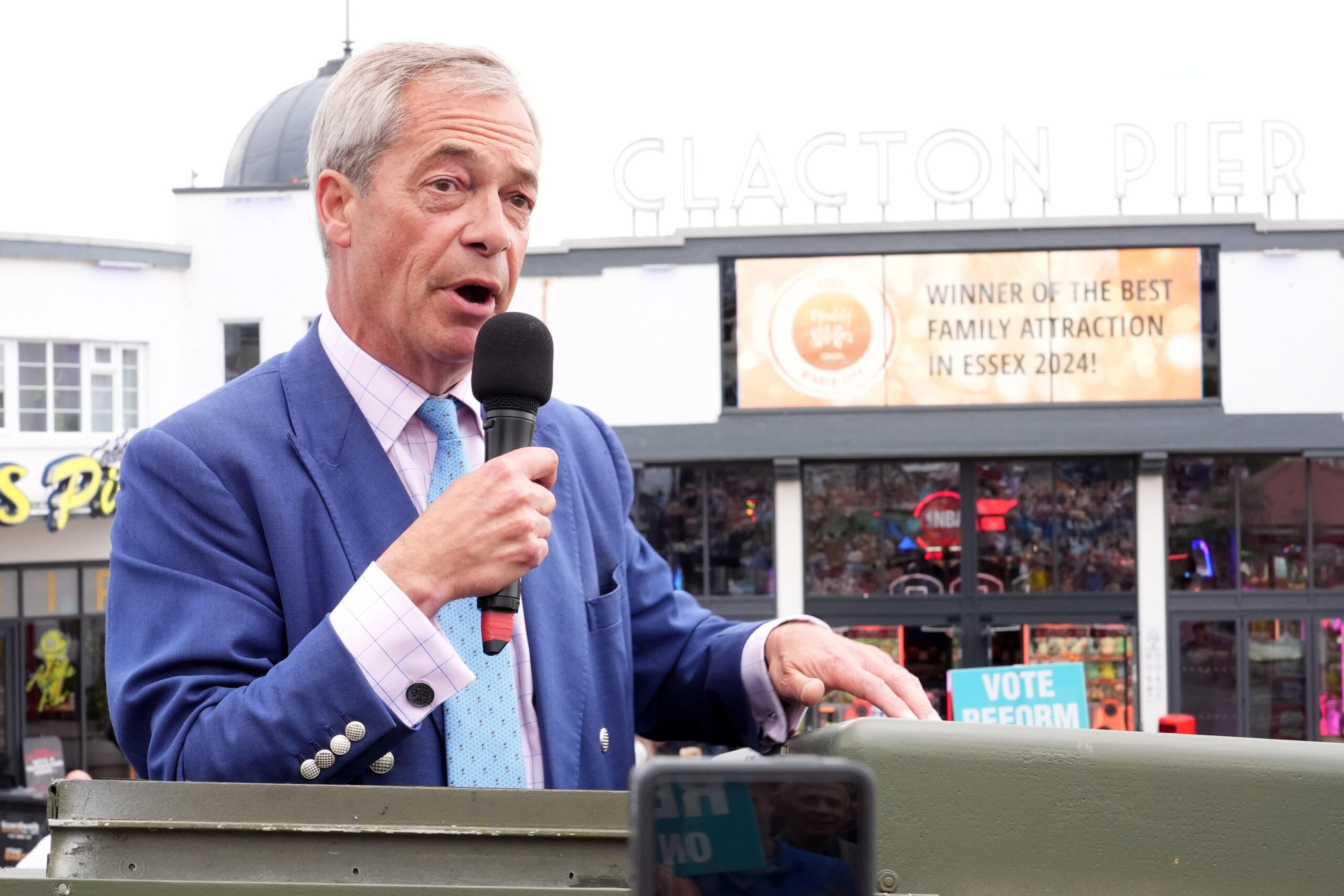 Nigel Farage faces questions over his election expenses during his successful bid to become MP for Clacton (Ian West/PA)