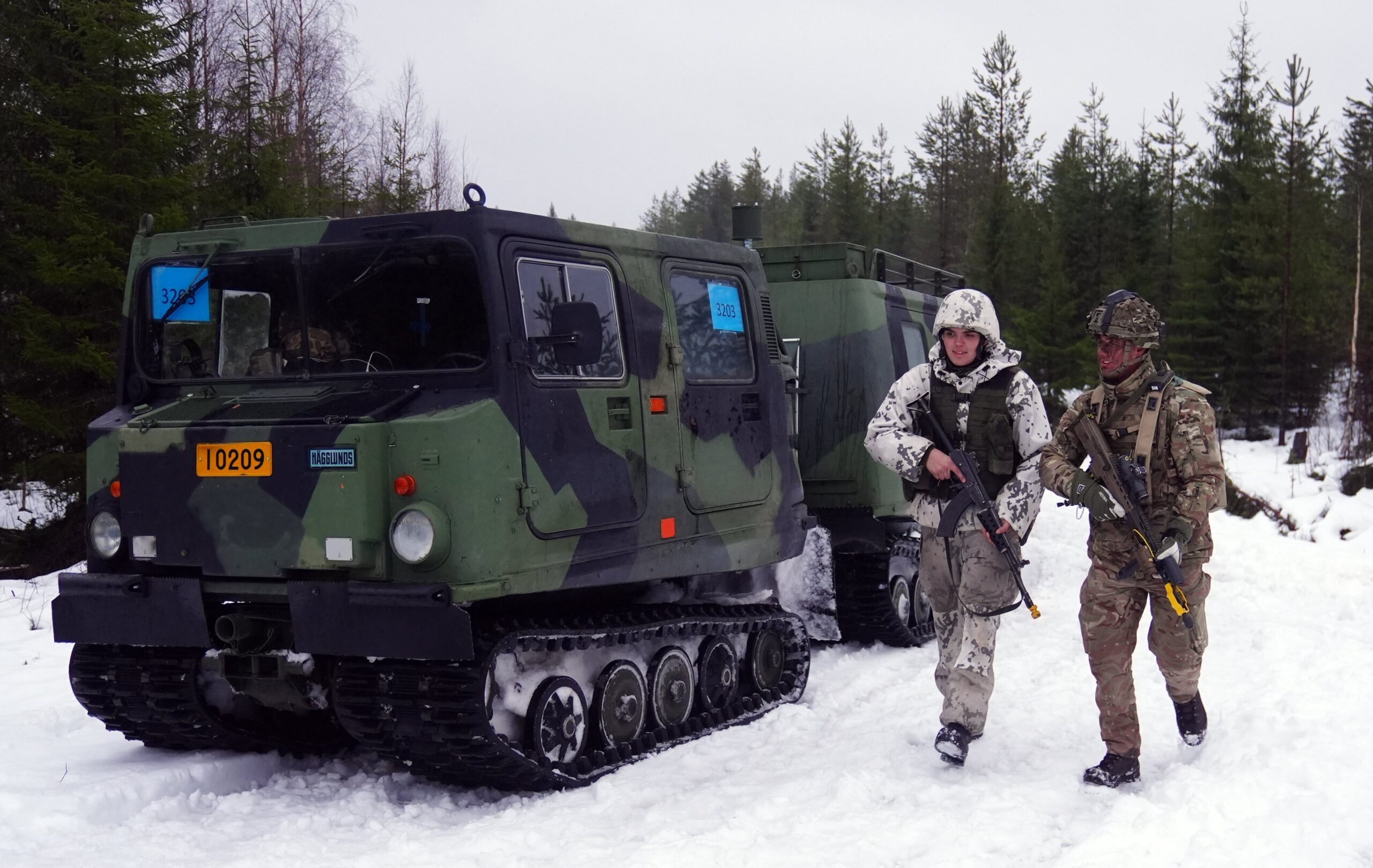 Jaeger Aapo Peltokongas from the Finnish army and Lance Corporal Aidan Rickards from 3 rifles in Vusoanka near Kajaani