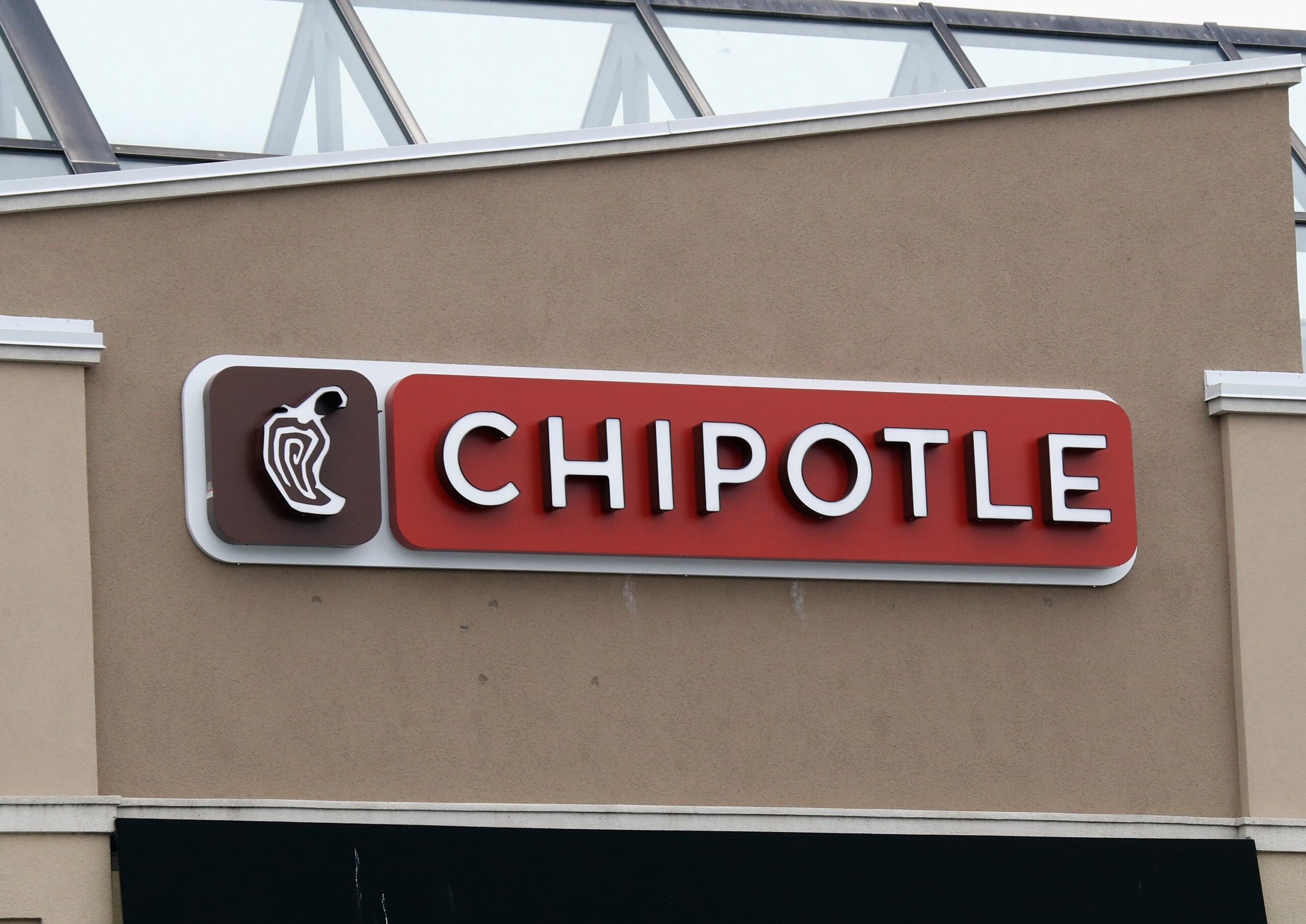 Three suspects are on the loose after a 16-year-old boy was found shot dead in the bathroom of a Chipotle restaurant in Philadelphia, according to police