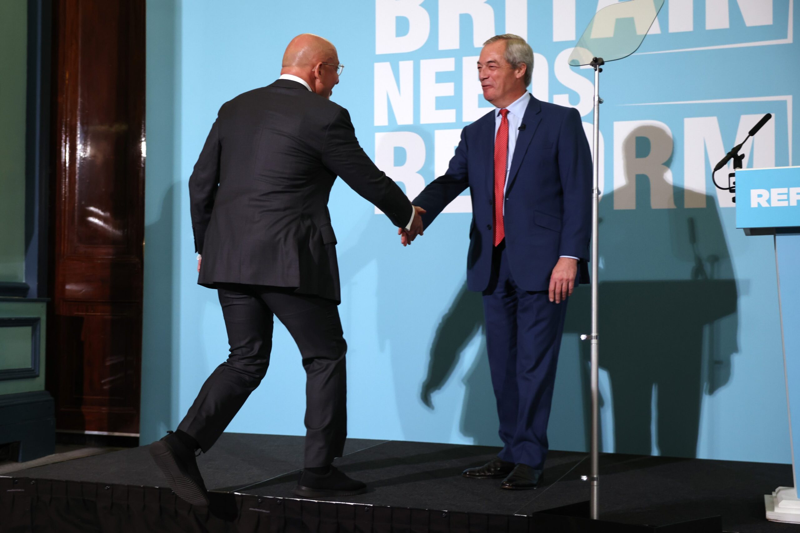 Former Chancellor of the Exchequer, Nadhim Zahawi, joins Reform UK Leader Nigel Farage during a press conference as he announces his defection to Reform UK, at the Institute of Directors on January 12, 2026 in London, England. (Photo by Dan Kitwood/Getty Images)