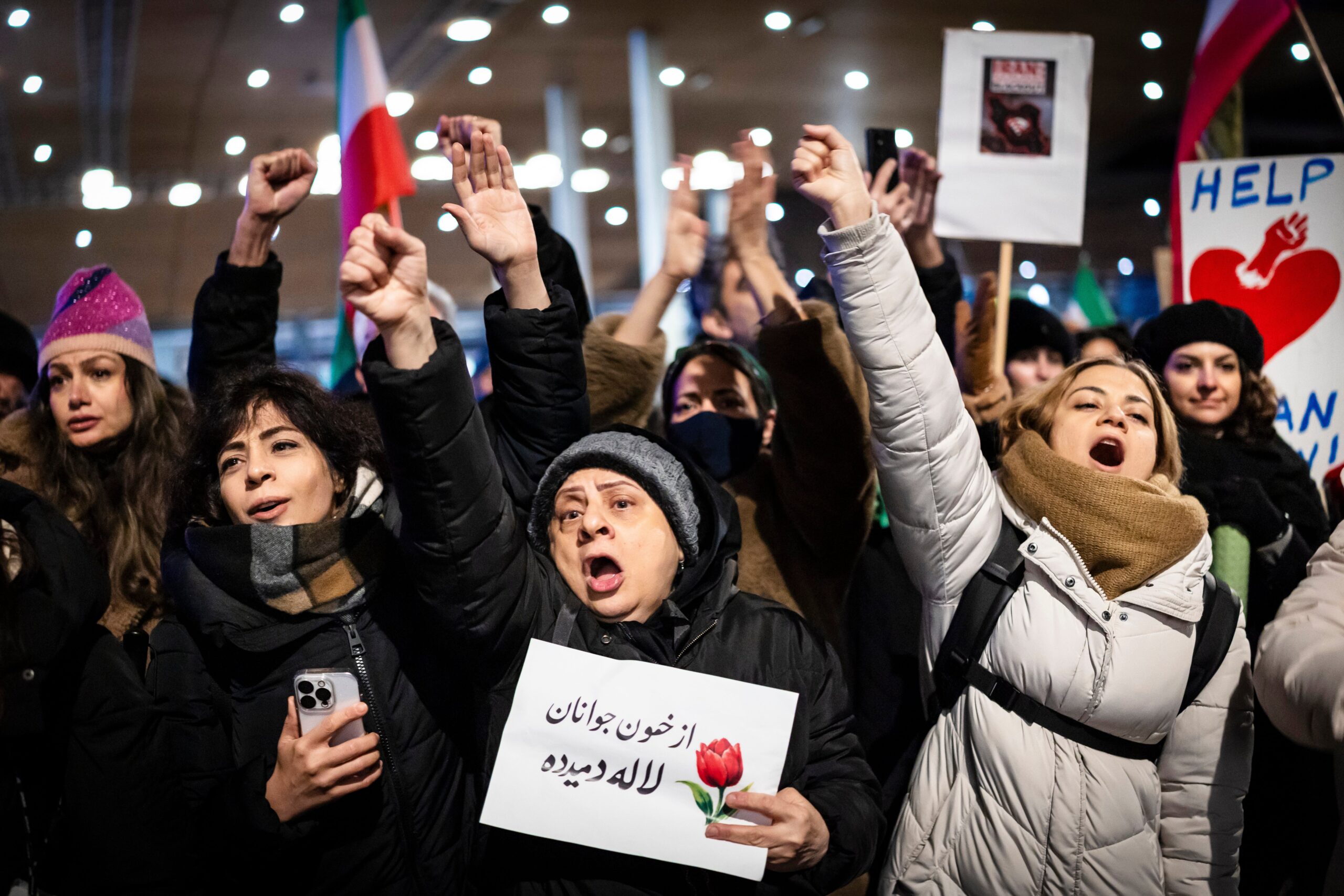 Protesters participate in a demonstration supporting protesters in Iran, Tuesday, 13 Jan 2026 in Zuerich, Switzerland