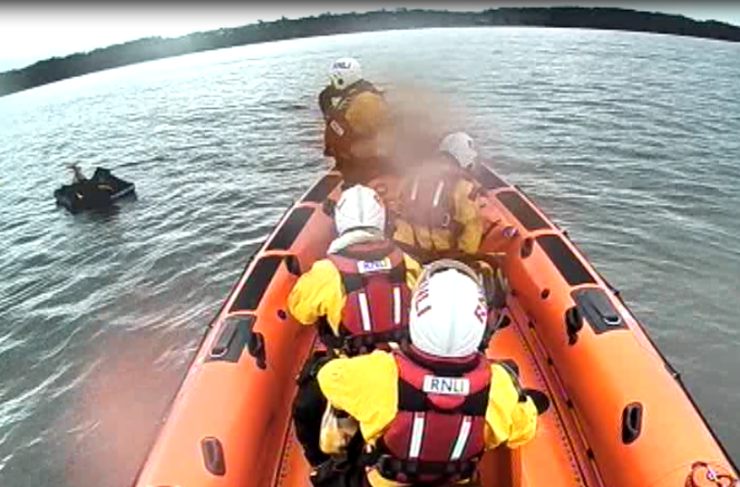 A person has been rescued after attempting to sail to a Scottish island on an inflatable mattress, RNLI volunteers said